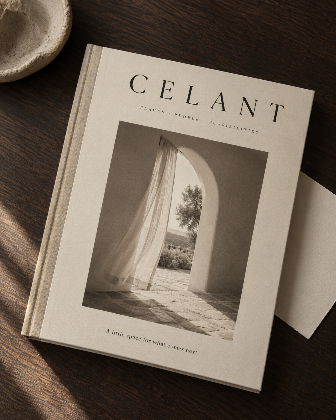 Illustrative CELANT journal mockup showing an arched doorway, used as a visual accompaniment to the enquiry page